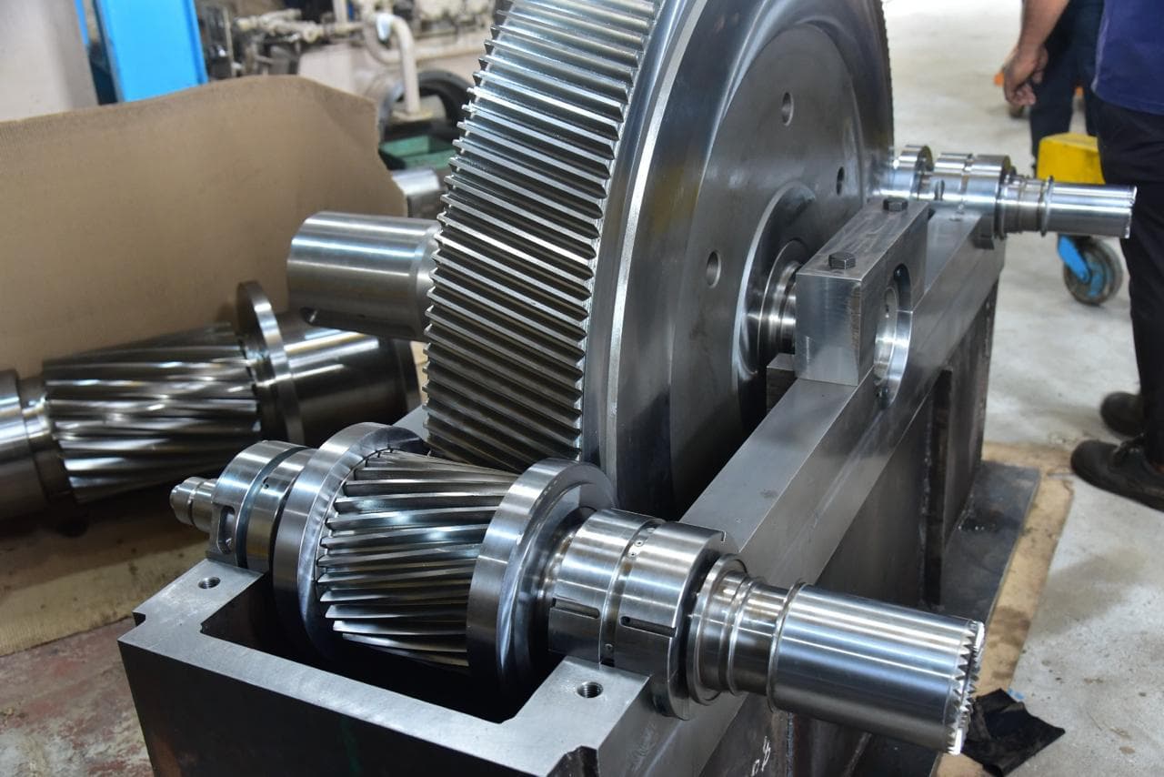 Bull gear and pinion assembled on their shafts before the casing is closed