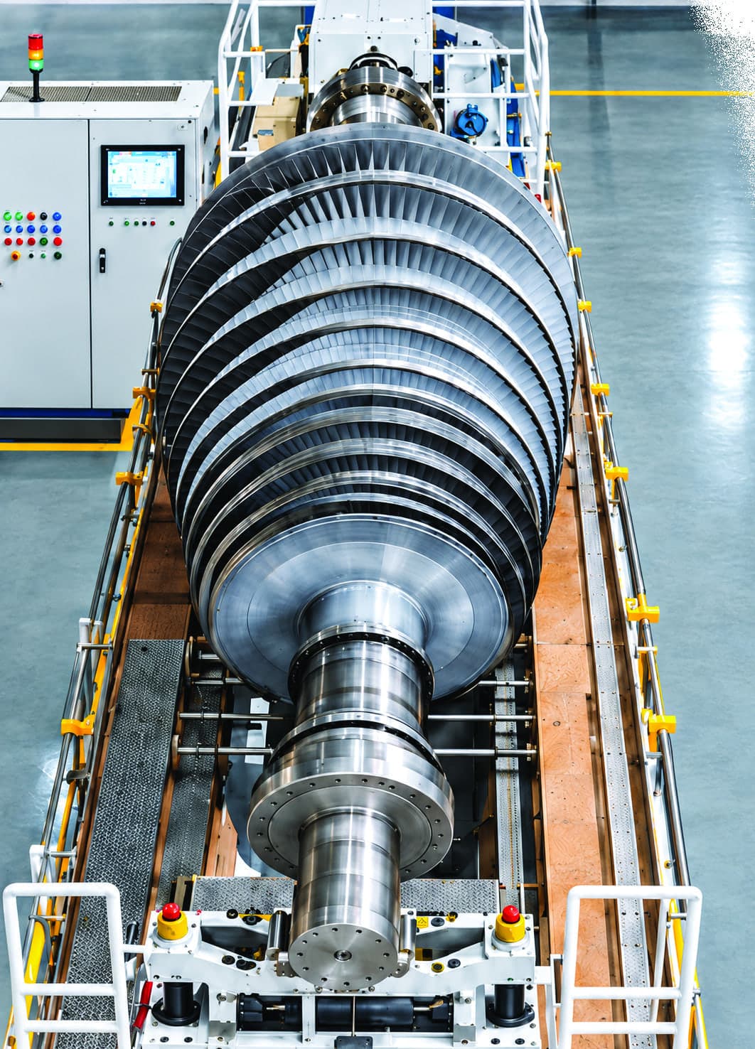 A steam turbine rotor installed on the low-speed balancing system